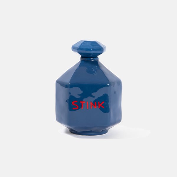 Blue ceramic sculpture by David Shrigley with red detailing on white, part of Fine Art Multiples and resembling a perfume cask.
