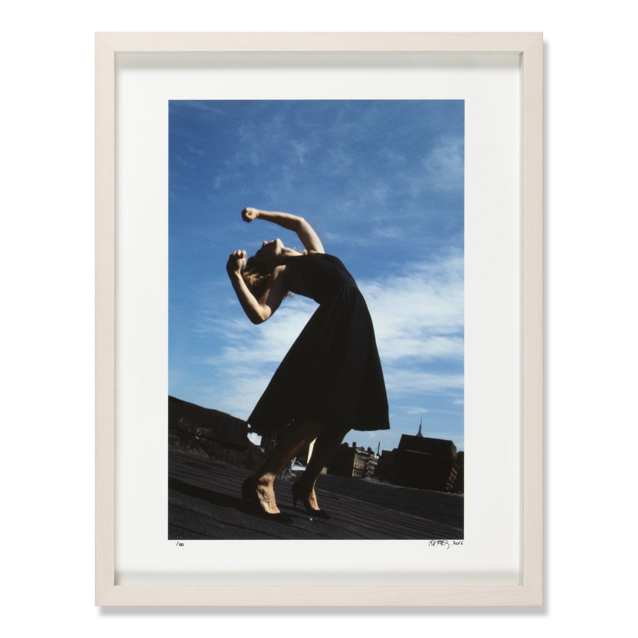 Robert Longo print Janet from Men in the Cities showing a woman in a dramatic leaning pose against a blue sky.