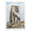 JR – 28 Millimeters, Portrait of a Generation: Building with a large mural of a face on its side, surrounded by rubble and construction equipment.